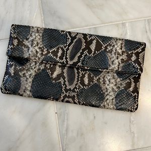 Python skin clutch